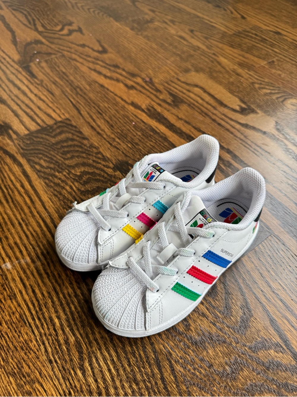 adidas White Kids Sneakers with Blue, Red, Green & Yellow Stripes